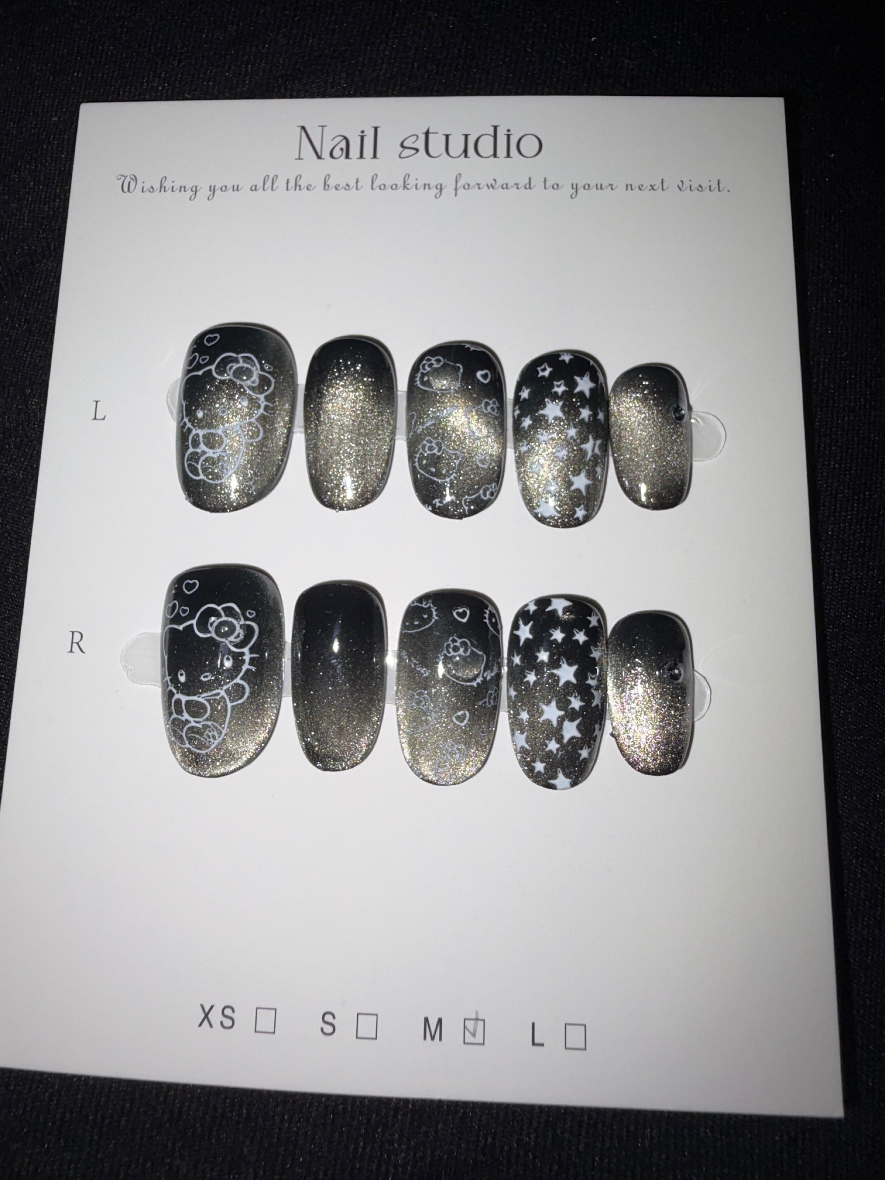 Black cateye hello kitty sanrio press on nails