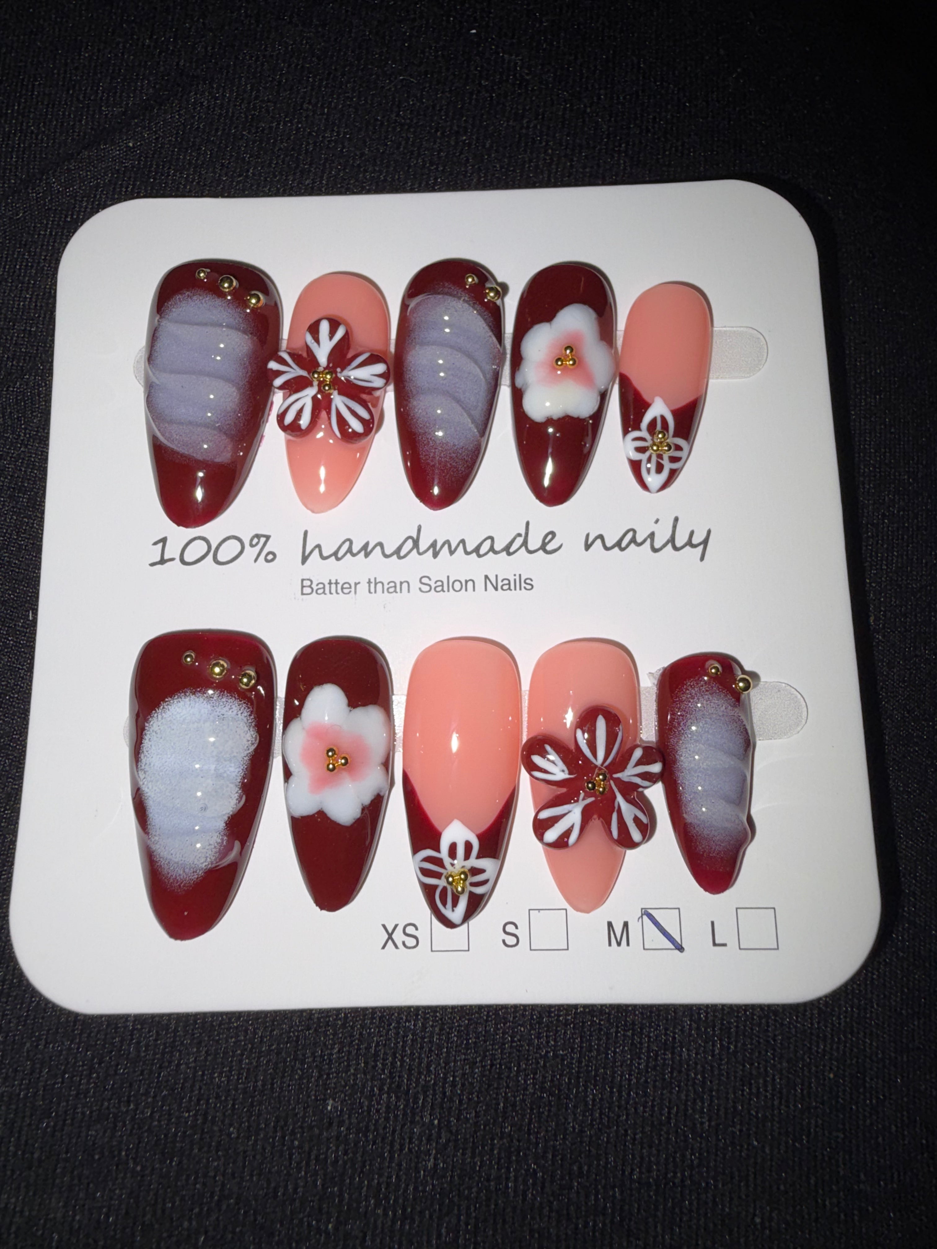 Red floral French press on nails