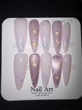 Purple stilettos with glitter press on nails